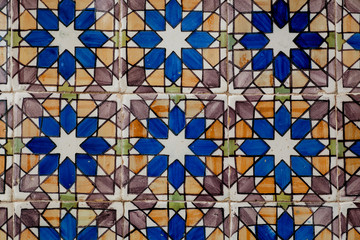 Colorful tiles on wall with traditional patterns, circa 16th century, Portugal