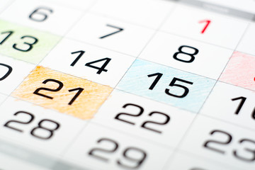 orange and blue frame on Calendar Closeup. Blurred background.