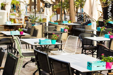 restaurant patio exterior environment of tables and chairs furniture in blossom park outdoor summer place
