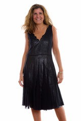 Studio shot of mature happy woman smiling and standing