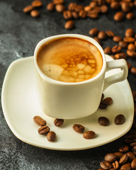 coffee and coffee beans (hot flavor drink) aperitif. food background. top