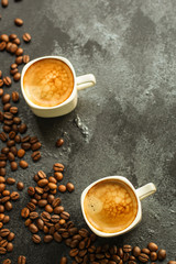 coffee and coffee beans (hot flavor drink) aperitif. food background. top