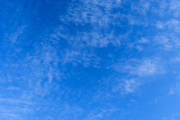 The blue sky and white clouds indicate pure and freshing.