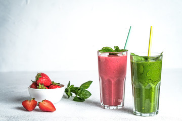 Organic berry and vegetable smoothie with oatmeal on a light background. Healthy food. Lactose free diet.