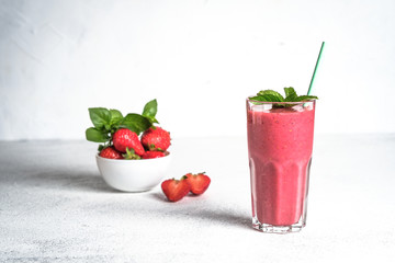 Organic berry and vegetable smoothie with oatmeal on a light background. Healthy food. Lactose free diet.