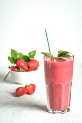 Organic berry and vegetable smoothie with oatmeal on a light background. Healthy food. Lactose free diet.