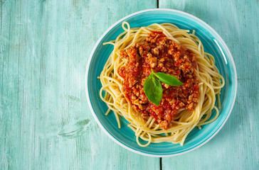 spaghetti bolognese on wooden surface - 270474423