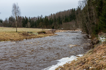 frozen river in winter countryside