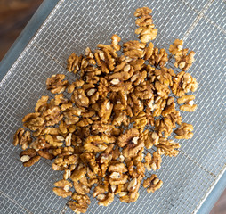Midsection Of Woman Holding Walnut