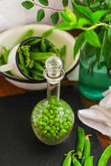 green peas (fresh, organic vegetables) vitamins. food background. top