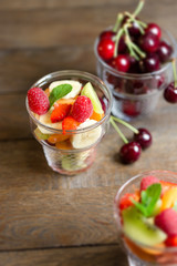 Freshly prepared fruit salad, a delicious meal in warm summer day