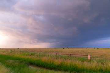 Storm passing at sunset