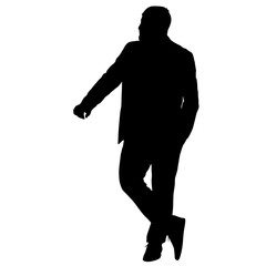 Black silhouette of a walking man on a white background