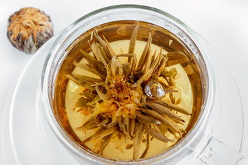 Chinese tea with a blooming flower when brewing