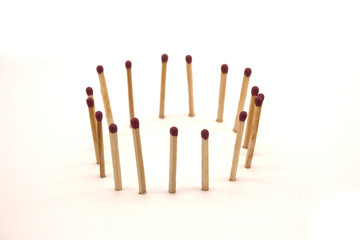matches stand in the circle on a white background