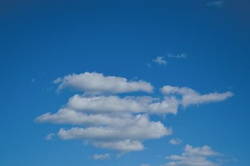 Blue summer sky with light white clouds. Blue sky and cloud image.