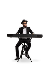 Male musician playing a keyboard