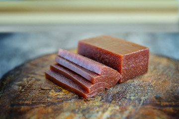 Concept of homemade sweet and natural flavor. Sweet of guava, with name of Goiabada, a typical Brazilian sweet common in the state of Minas Gerais.