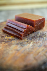 Concept of homemade sweet and natural flavor. Sweet of guava, with name of Goiabada, a typical Brazilian sweet common in the state of Minas Gerais.