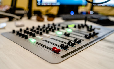 Mixer at the radio station studio recording broadcasting