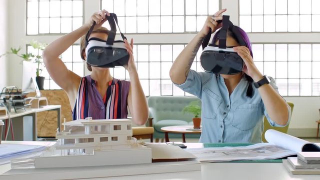 Architect and client with virtual reality glasses