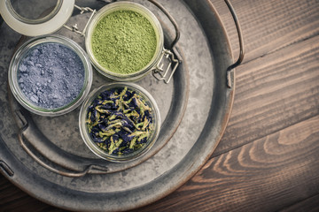 Green and blue matcha tea powder