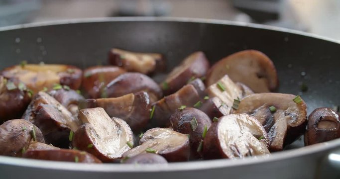 Sauteed mushrooms in pan
