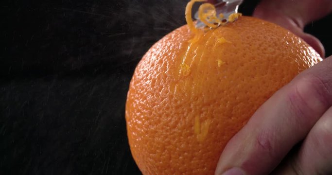 Citrus zester on dark background 
