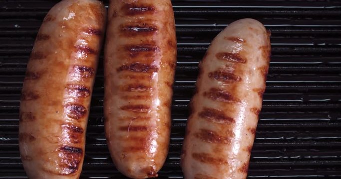 Pork sausages on grill