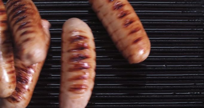 Pork bangers in pan