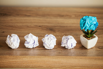 Creative idea concept.Inspiration, New idea and Innovation concept with Crumpled Paper on wood background