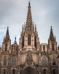 Fototapeta na wymiar Monumental facade of Santa Creu Cathedral in Barcelona