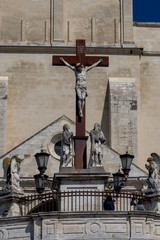 Avignon. Sculpture from a tree of the crucified Christ on an iron cross.