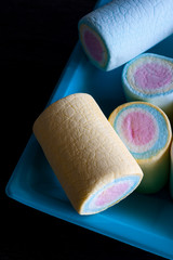 SWEETS OF CLOUDS ON DARK BACKGROUND