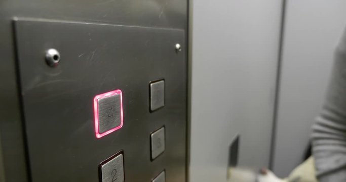 pressing button elevator