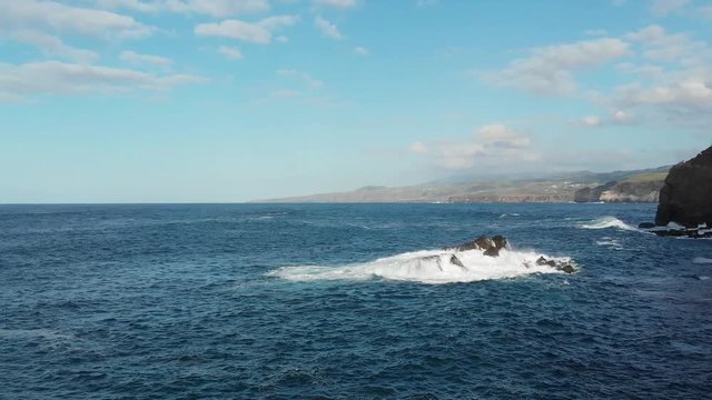 Aerial Drone Azores Portugal Waves crashing on rocks in sea