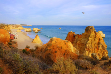 View on the beach Praia de Rocha in Portimao, Algarve, Portugal.