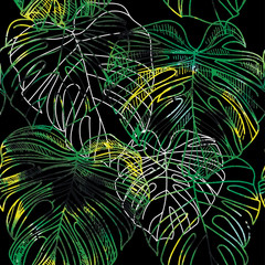 Seamless pattern with leaves of tropical plants . Vector freehand drawing . Background with palm leaf 