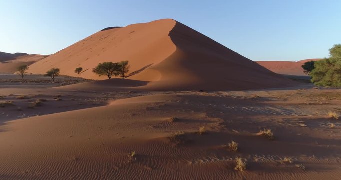 Tilt up aerial view of  one of the vast sand dunes in the Namib desert