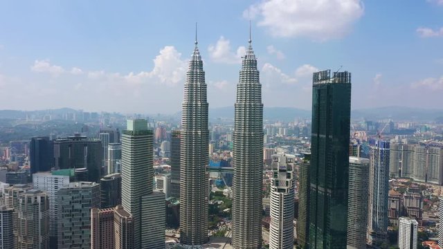 sunny day kuala lumpur downtown famous towers top cityscape aerial panorama 4k malaysia