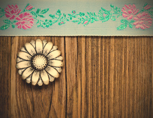vintage aqua color tape with embroidered ornaments and old button