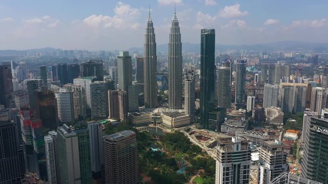 sunny day kuala lumpur downtown famous towers top cityscape aerial panorama 4k malaysia