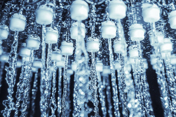 Shower head with running water closeup