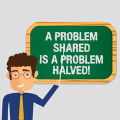 Handwriting text A Problem Shared Is A Problem Halved. Concept meaning Communication makes things easier Man Standing Holding Stick Pointing to Wall Mounted Blank Color Board