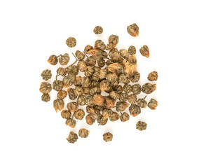 Obraz premium Dried chrysanthemum on white background. Top view