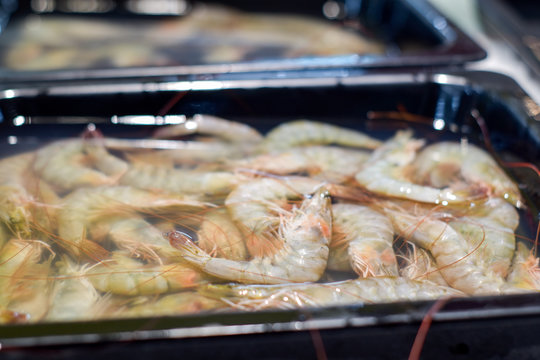 Chilled shrimp on supermarket, blur image