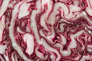 Obraz premium close up view of fresh colorful cut textured red cabbage