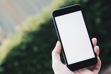 Cropped hand with mobile smartphone