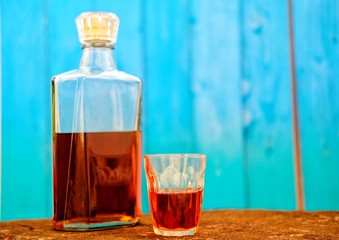 Close up whisky on old wood table