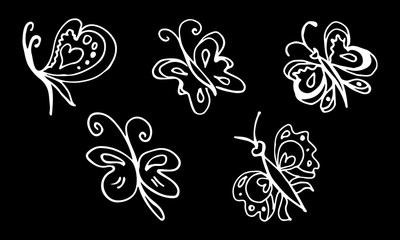 Set of hand drawn butterflies isolated on black background. Vector doodled elements for decoration